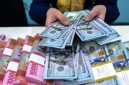 Ilustrasi penukaran mata rupiah dan dolar. (Sumber Foto: Istimewa)