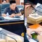 Anggota DPRD Jember terlihat memainkan game di ponselnya sambil memegang rokok saat Rapat Dengar Pendapat (RDP) Komisi D yang membahas layanan kesehatan, momen yang kemudian viral dan menuai sorotan publik. (Sumber Foto: Istimewa)