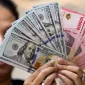 Ilustrasi Rupiah dan Dolar AS. (Sumber Foto: Istimewa)
